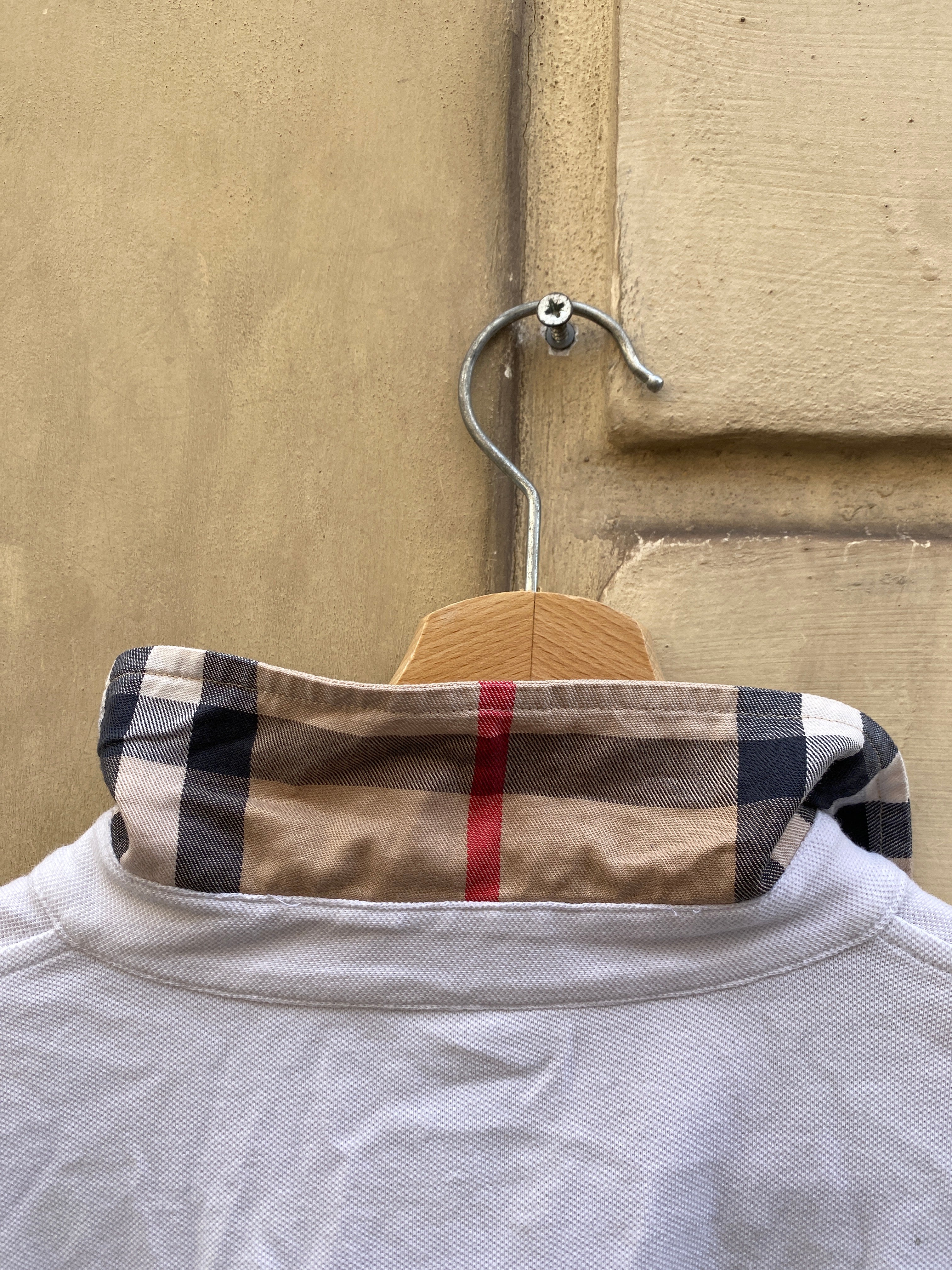 POLO BIANCA CON COLLETTO A SCACCHI DA DONNA