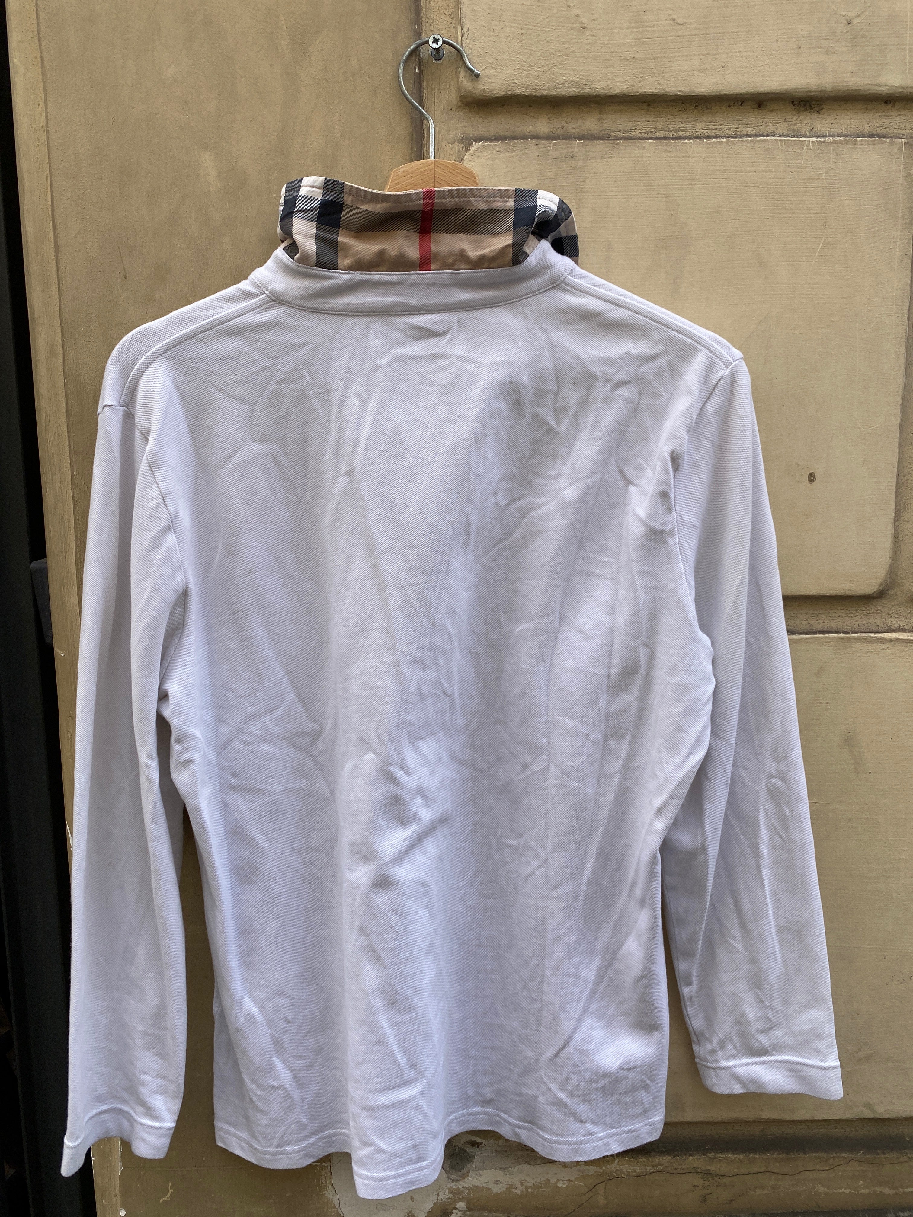 POLO BIANCA CON COLLETTO A SCACCHI DA DONNA