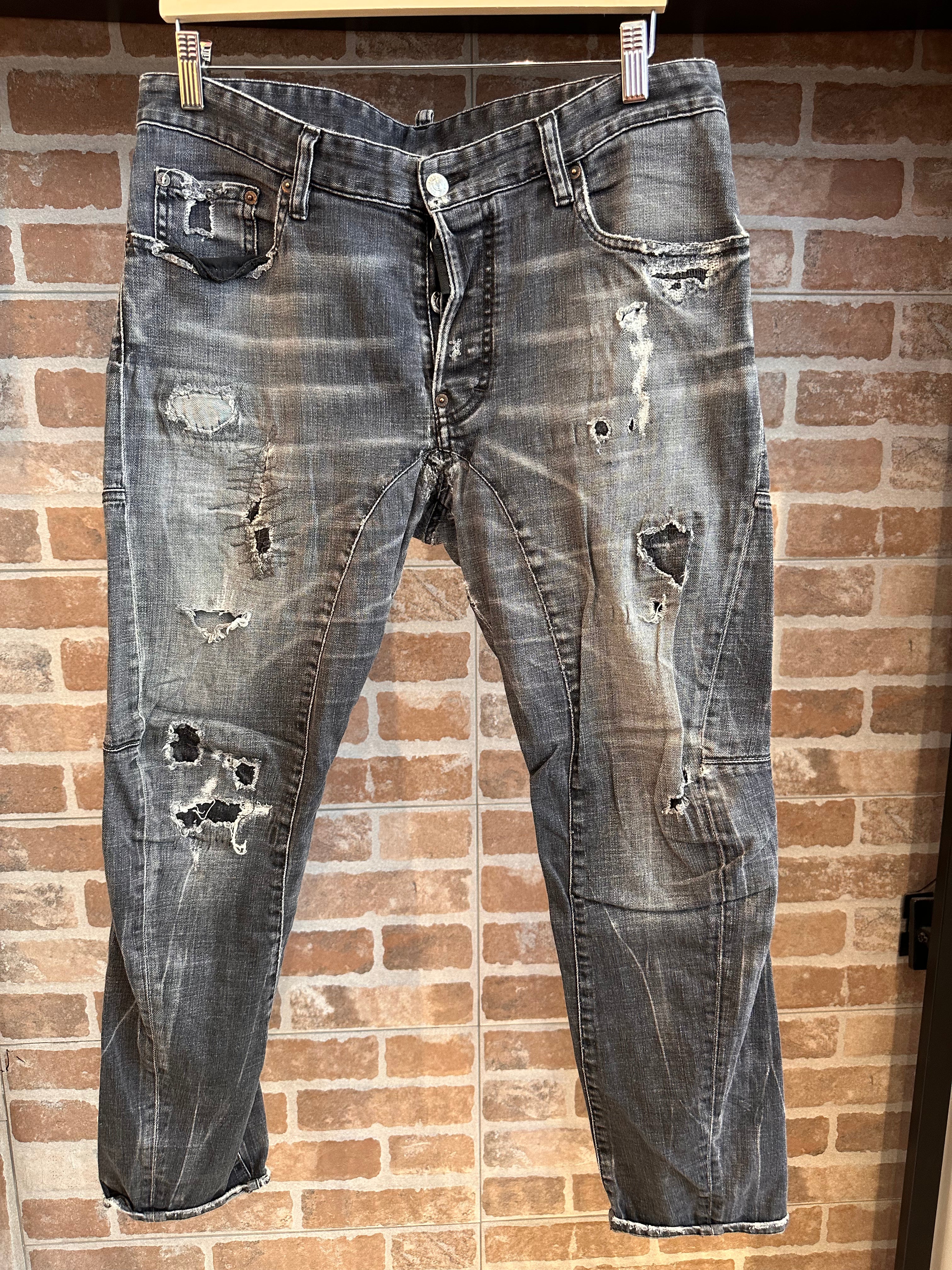 JEANS STRAPPATI NERI DA UOMO