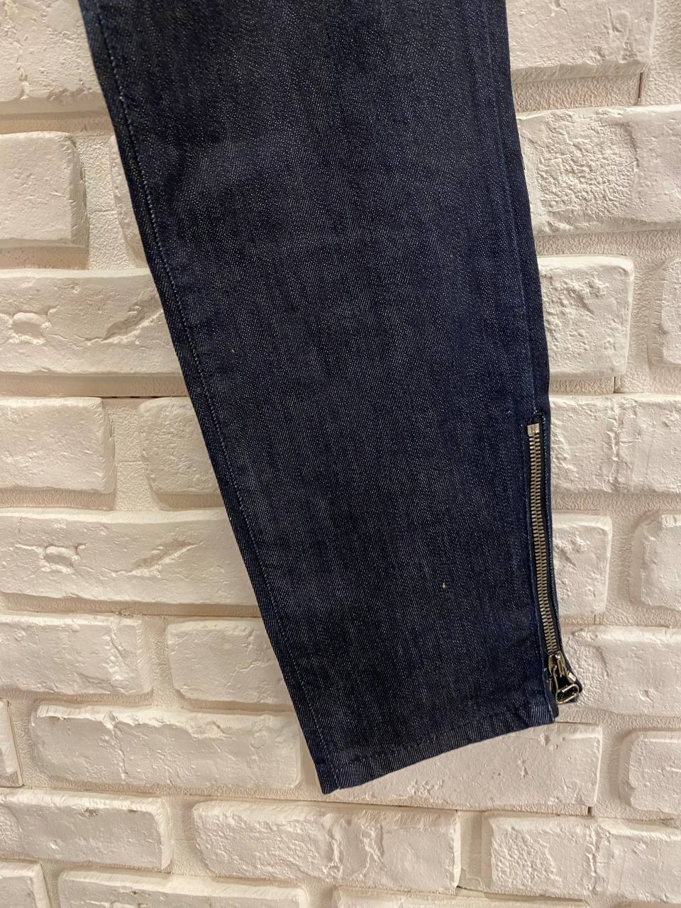 JEANS IN DENIM BLU SCURO CON DOPPIE TASCHE